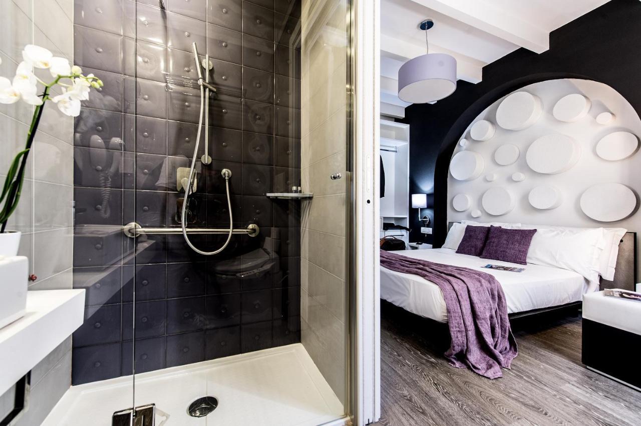 Emphasis Suites & Rooms Кальярі Екстер'єр фото