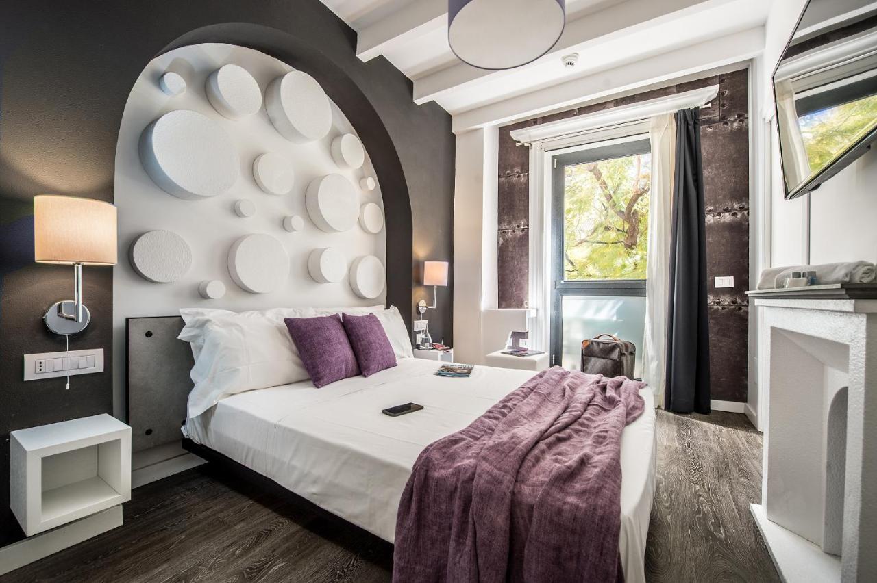 Emphasis Suites & Rooms Кальярі Екстер'єр фото