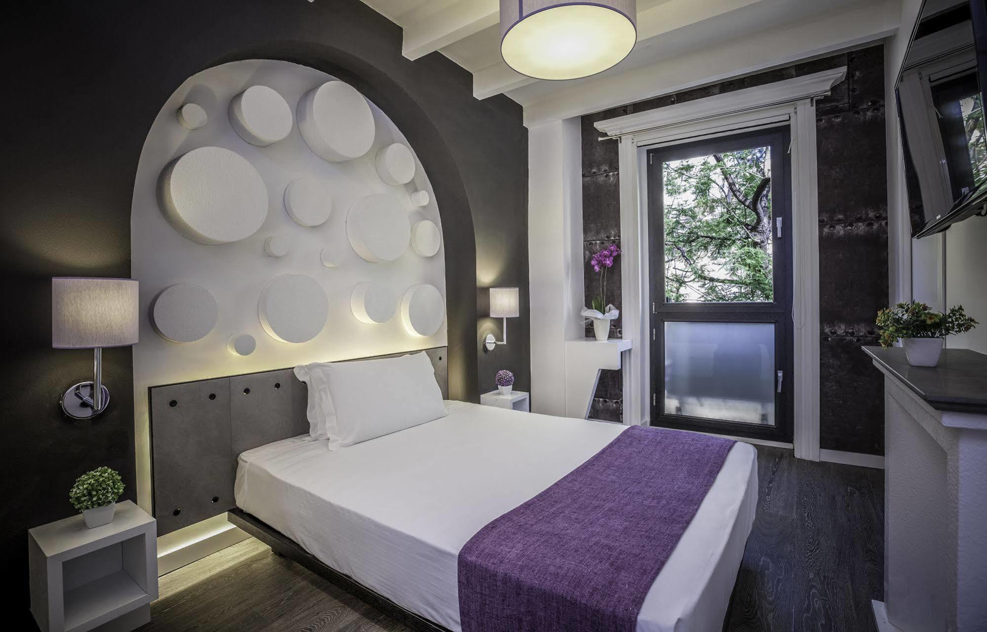 Emphasis Suites & Rooms Кальярі Екстер'єр фото